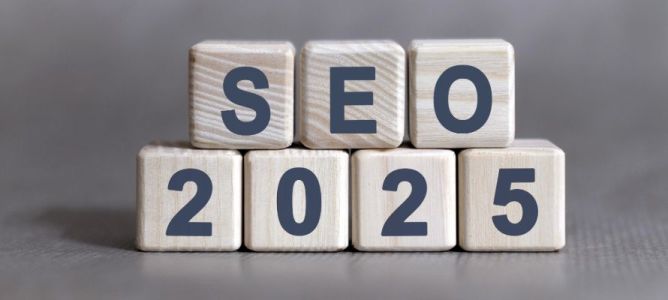 wooden blocks spelling SEO 2025 on grey background