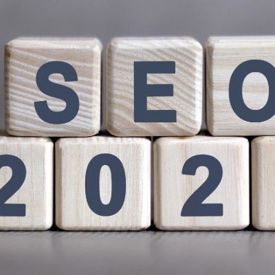 wooden blocks spelling SEO 2025 on grey background